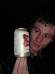 Caleb pointificating the Miller High Life