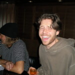Clev and a stranger fake laughing at Lily's