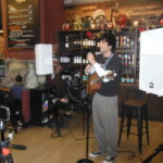 Me playing at Vintage Vino & Espresso